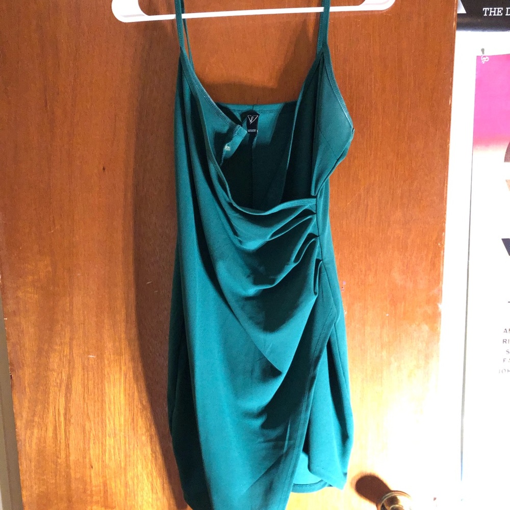 Short, asymmetrical emerald green Windsor prom dress. Only worn once.